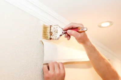 Pose de papier peint aux Junies — revêtements muraux et toiles de verre
